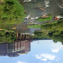 a bridge over a river in a city