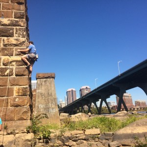 a bridge leading to a brick wall