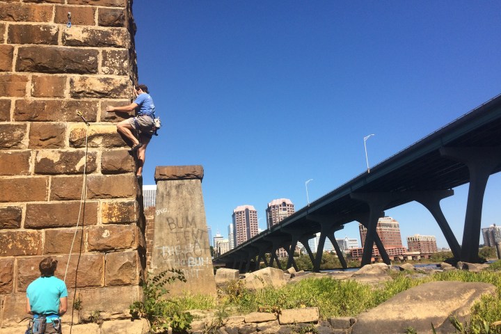 a bridge leading to a brick wall