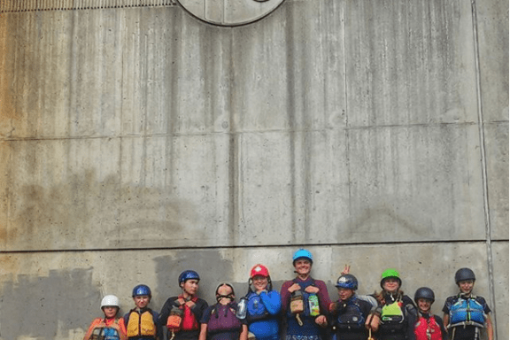 a group of people posing for a picture