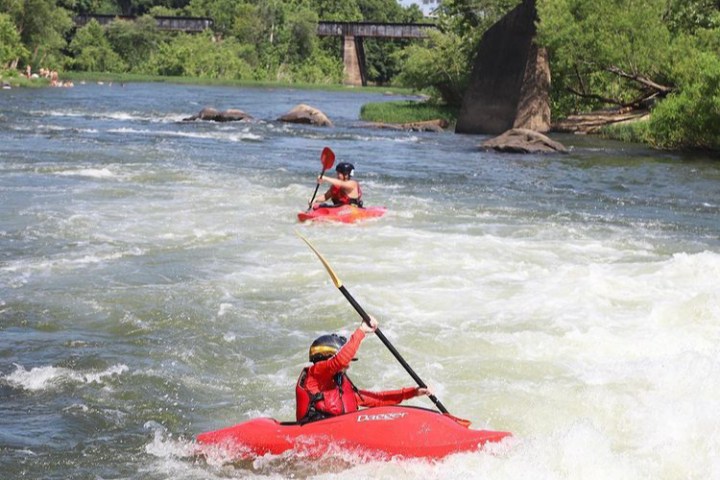 a man riding skis on a body of water