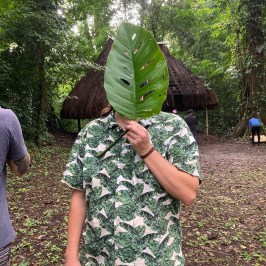 a group of people standing in a garden
