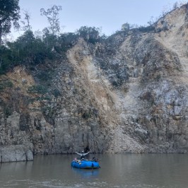 a small boat in a body of water
