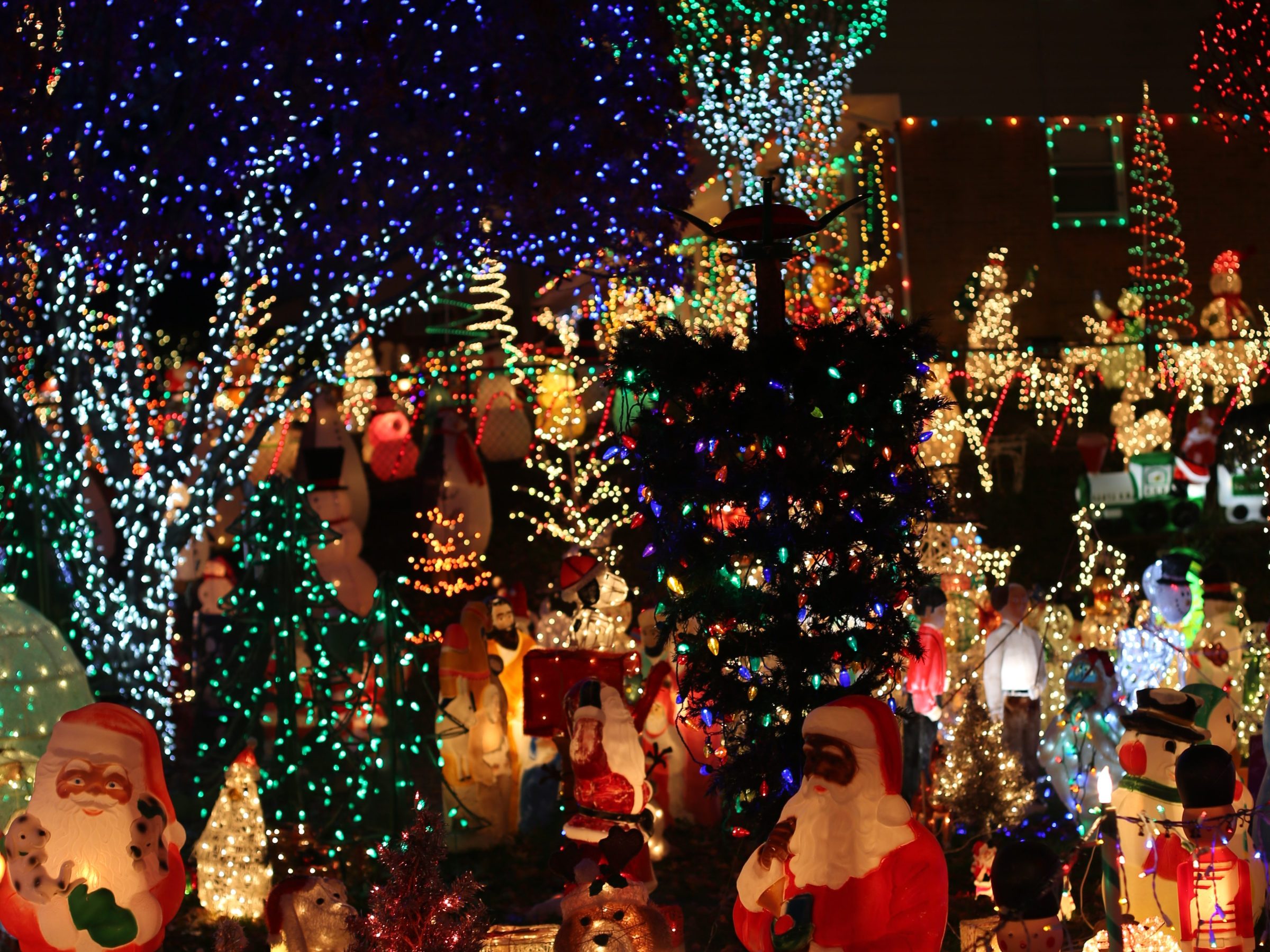 a group of people sitting at night
