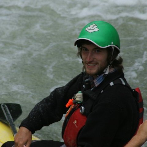 Eric Jakov Fak in a raft on the water