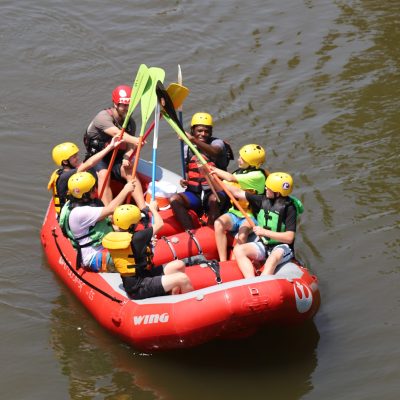 a small boat in a body of water