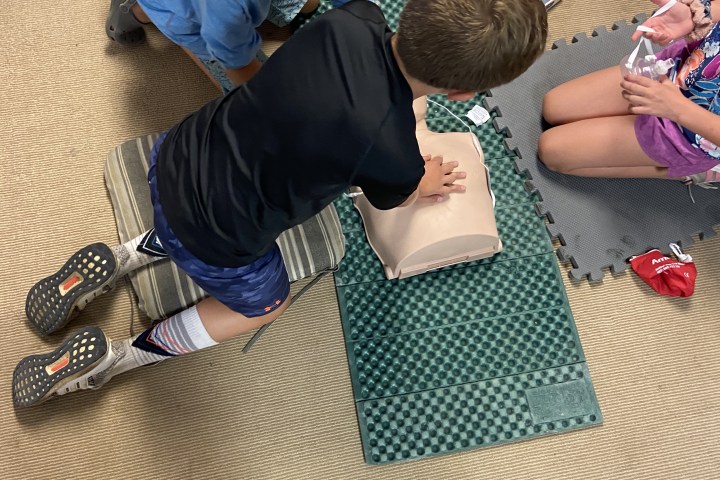kids doing CPR